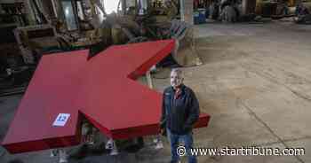 Bidder's nearly $2K wins him the big red 'K' from atop the former Lake Street Kmart