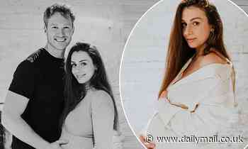 Greg Rutherford cradles his pregnant fiancée Susie Verrill's blooming bump in stunning snaps