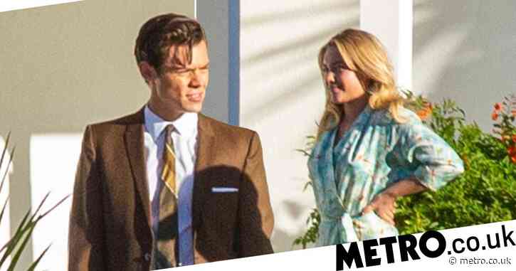 Harry Styles looks suave as ever behind the scenes on Don’t Worry Darling set with Florence Pugh