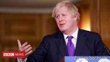 UK PM hails vaccine but warns it is 'not game over'