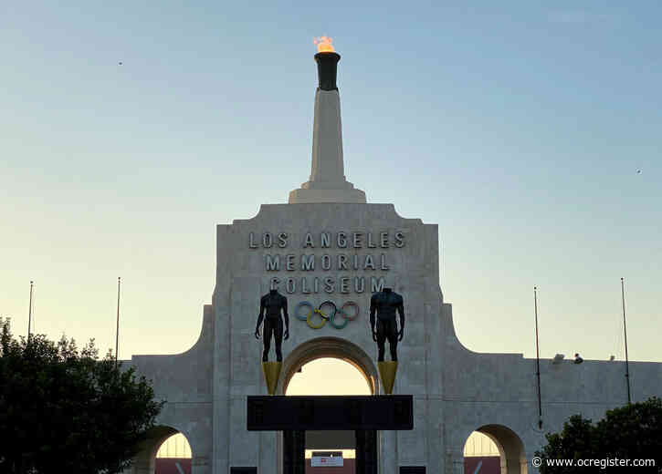 Torch at LA Coliseum lit in memory of Rafer Johnson, 1960 Olympic gold medalist