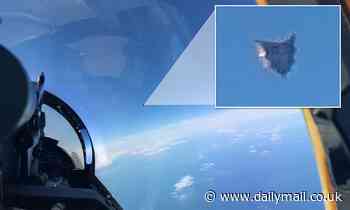 Leaked photo from Pentagon UFO task force shows sliver cube hovering over the Atlantic