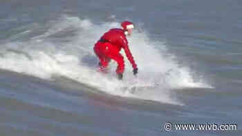 'Surfing Santa' catches waves at Hamburg beach