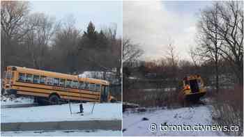 Police investigating after two school buses stolen, driven into ponds in Vaughan, Ont.