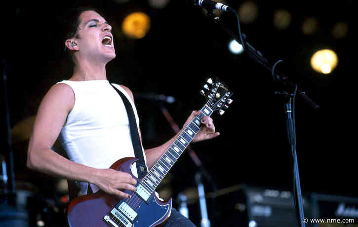 Placebo are donating Brian Molko’s guitar to raise funds for struggling live crew