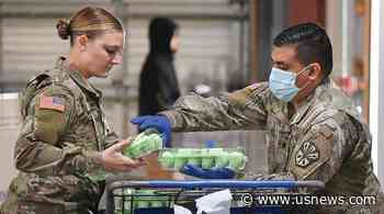 The Latest: Arizona Health Leaders Urge Masks as Cases Rise