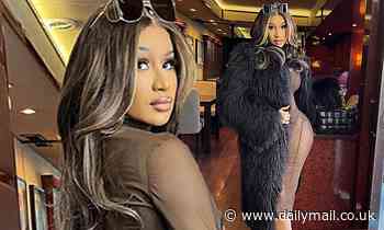 Cardi B displays her stunning curves in a completely sheer dress and thong bodysuit