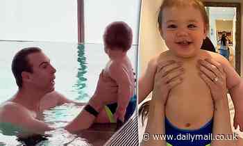 Olympic swimmer Grant Hackett teaches his adorable eleven-month-old son Edward how to swim