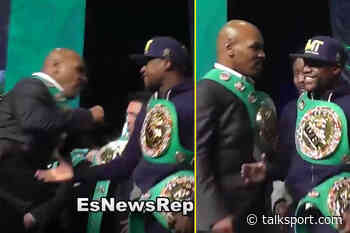 Watch when Mike Tyson threw a punch at Floyd Mayweather on stage and Mayweather didn’t even flinch - talkSPORT.com