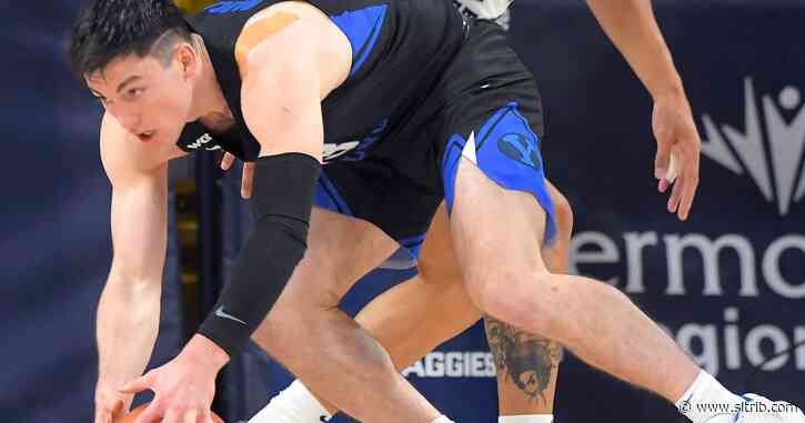 BYU edges Utah State 67-64 in Aggies’ home opener