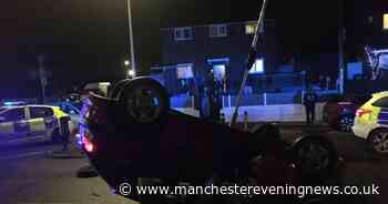 Car overturns and occupants flee the scene following crash in Bolton - Manchester Evening News