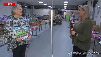 Salvation Army making sure kids have toys under the tree