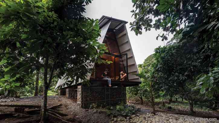 Prefabricated Huaira cabin nestles within verdant farmland in Ecuador