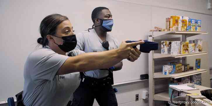 We went inside the Baltimore Police Department to see what de-escalation training looks like - and how it could help fix policing