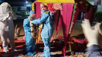 See Indian couple get married in full PPE