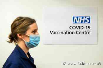 Britain starts virus jabs, more encouraging vaccine developments