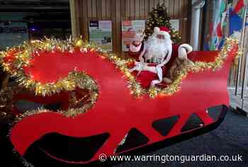Warrington Youth Club and Warrington Rotary Club help Santa come to town