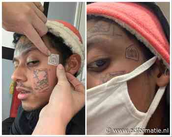 Amerikaanse Albert Heijn-fan laat logo op gezicht vereeuwigen