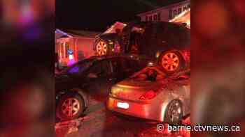 BMW becomes airborne after series of crashes, lands on parked vehicles in Bradford
