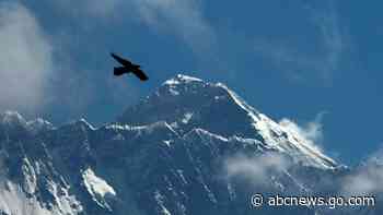 Why did Mount Everest's height change?