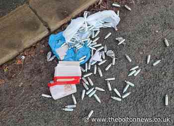 Anger after laughing gas cannisters dumped on Piggott Street, Farnworth