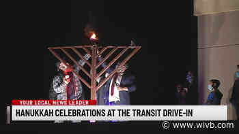The first night of Hanukkah celebrated at the Transit Drive-In