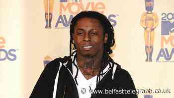 Rapper Lil Wayne admits weapon charge after search of private plane
