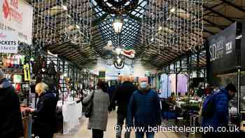Spirits lifted: Belfast city centre shoppers back out in force as Christmas rush resumes