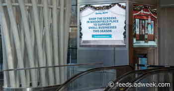 Goldman Sachs Takes Over Screens in NYC Shopping Area and Its Own Instagram Account