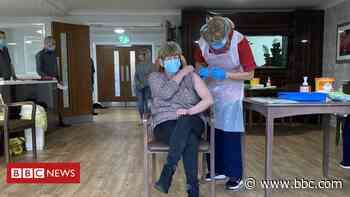 Coronavirus vaccine: Belfast care home residents receive Covid-19 jab - BBC News