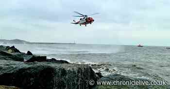 Dramatic coast rescue as coastguard airlift injured person to safety
