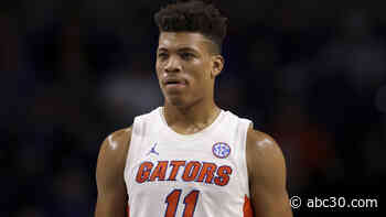 Florida's standout forward, Johnson, hospitalized after collapsing on court