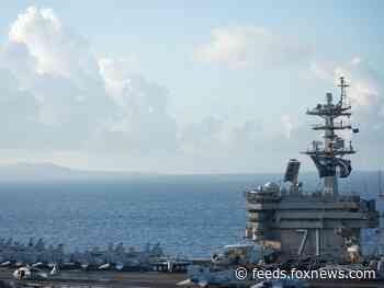 Aircraft carrier Theodore Roosevelt conducts 'man overboard' search for missing sailor