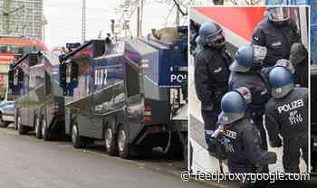 Germany erupts in protests: Armed police with water cannons brace for riots in Dresden