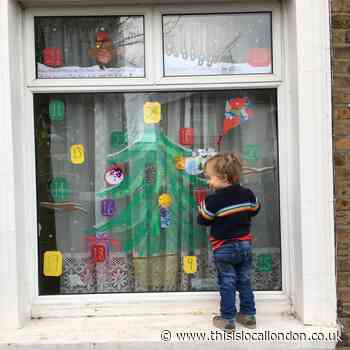 Family create window advent calendar in memory of their baby