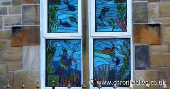 In pictures: Amble's 'festival of lights' illuminates windows across town