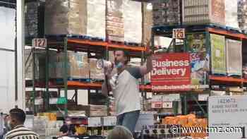 Anti-Masker Grabs Megaphone, Climbs Display to Rant Inside Costco