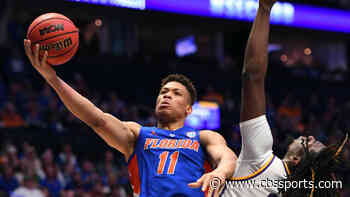 Florida's Keyontae Johnson placed in medically-induced coma after collapsing during game Saturday