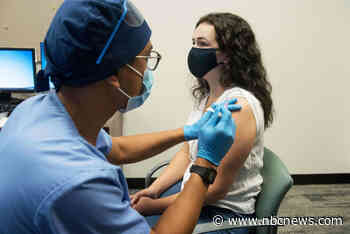 A 'constant flow' of vaccine: Pfizer's Covid-19 shots begin massive rollout