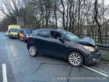 Two cars collide in crash in Moss Bank Way, Bolton