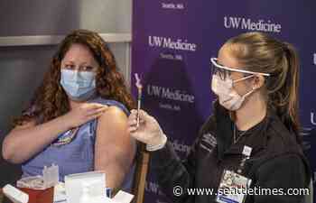 Front-line medical workers get first doses of coronavirus vaccine in Seattle - Seattle Times
