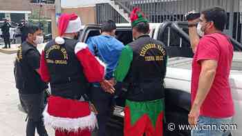 Peruvian police dress as Santa and elves for drug raid