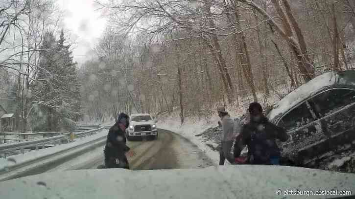 VIDEO: Collier Township EMS Workers Almost Hit By Truck Sliding Across Snowy Road