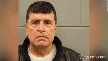 Former police captain charged with aiming gun at repairman thinking he was a voter fraud 'mastermind'