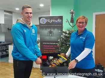 Blackburn Rovers: Goalkeeper Thomas Kaminski delivers Christmas hamper to Nightsafe charity