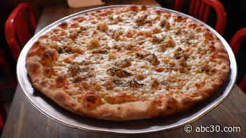 This pizza has 7 different types of seafood on it!