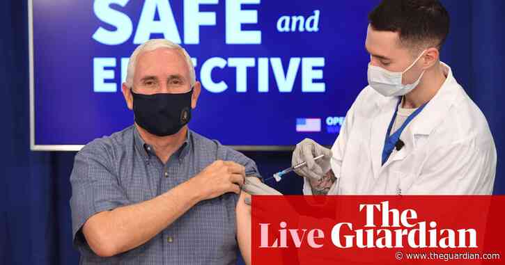 Pence receives Covid vaccine on TV as FDA panel recommends Moderna – live