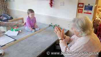 Care home resident meets great-grandchild for first time in Covid-secure reunion