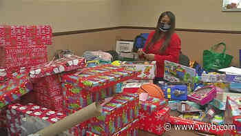 Buffalo police officers from its E-district are handing out presents this weekend to families