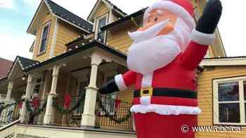 Inflatable holiday decorations are everywhere. Thank car dealerships for that